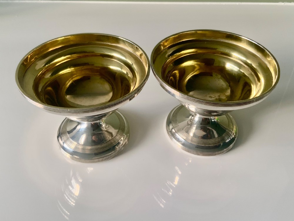 Pair of Georgian silver pedestal dishes - gilt interior
