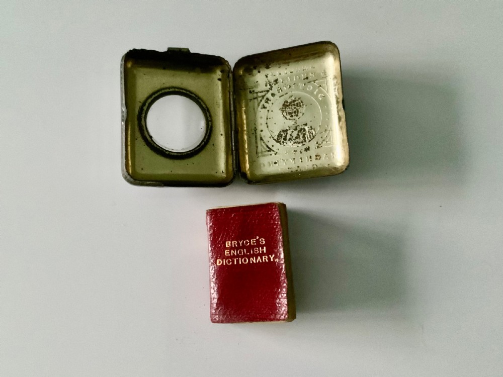 Bryces smallest English Dictionary with magnifyer View II