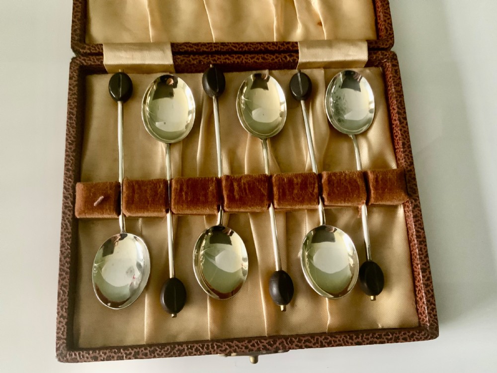 Demitasse silver and enamel spoons View V