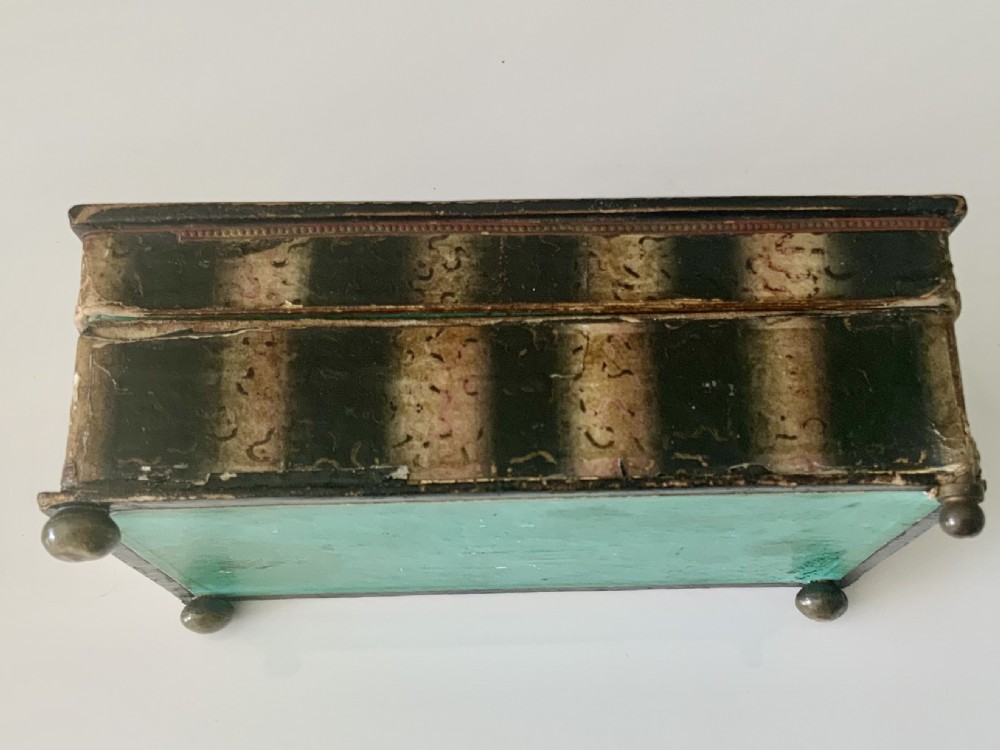 An early 19th-century rectangular French dragee box featuring a hand-coloured printed tavern scene set beneath a glass lid. View V