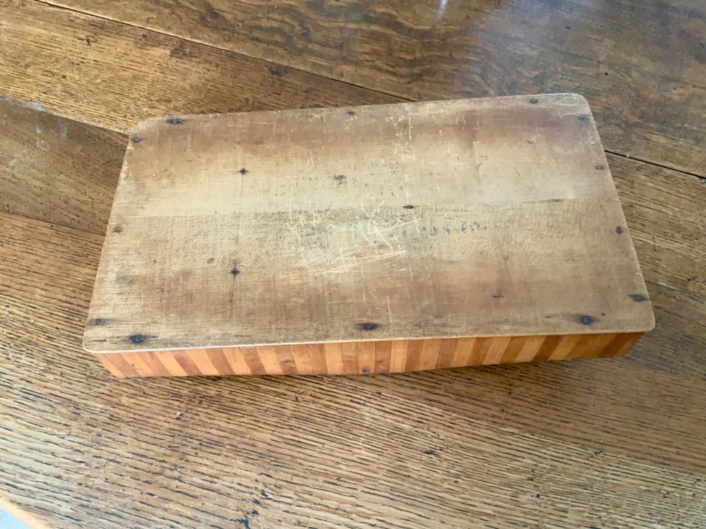 A nineteenth-century Scottish wooden cutlery tray with divided internal compartments, a turned cylindrical handle, and striped timber inlay along the exterior. View IV