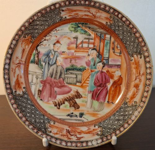 fig 1. A hand-painted Chinese export porcelain coffee cup and matching saucer with polychrome figures and geometric diaper borders.