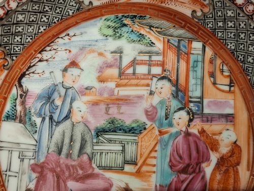 fig 2. A hand-painted Chinese export porcelain coffee cup and matching saucer with polychrome figures and geometric diaper borders.