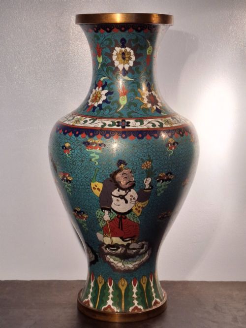 fig 3. A large Chinese cloisonne enamel baluster vase decorated with scholar figures on a turquoise scrollwork ground with gilded rims.