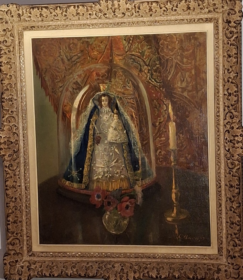 A framed 19th-century oil painting depicting a statue of the Madonna and Child beneath a glass cloche, flanked by a candle and a small vase of flowers. View III