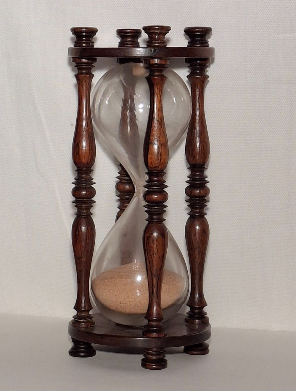 Medium sized antique Sandtimer / Hourglass in mahogony. Circa 1800.