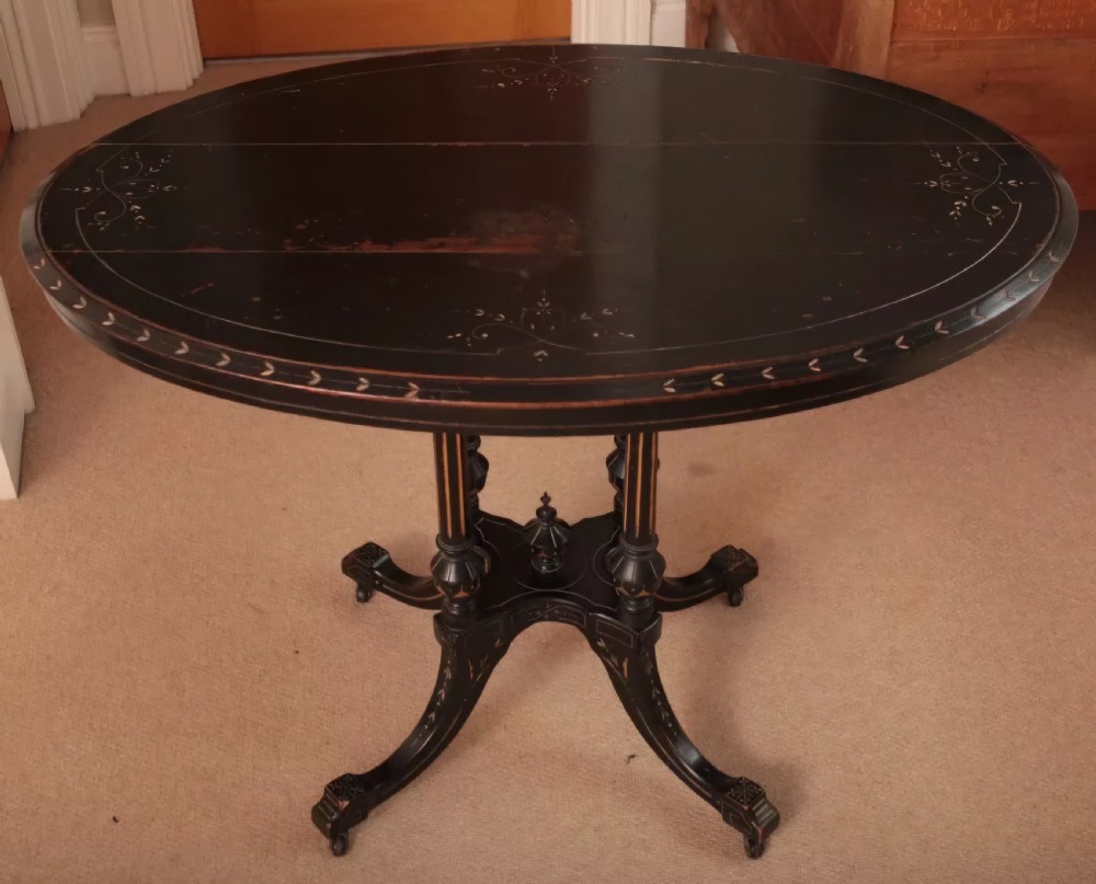Aesthetic Movement Ebonised Mahogany Oval Side Table. c1900
