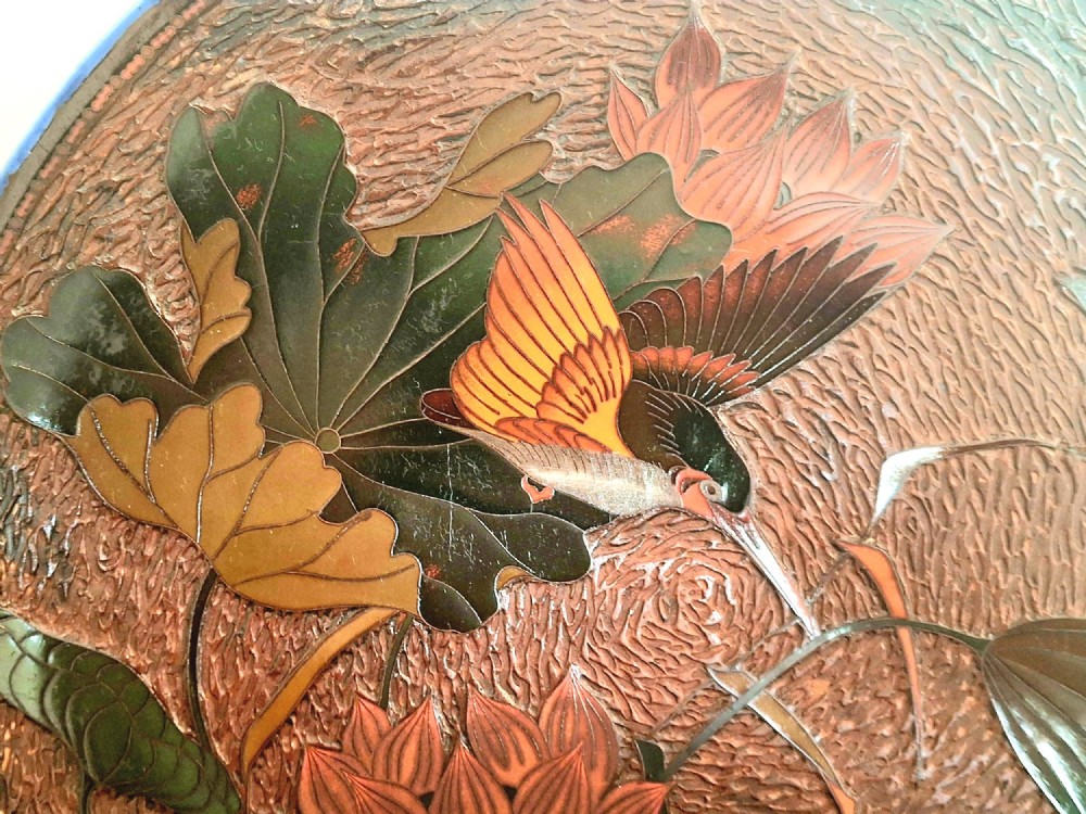 A pair of circular Japanese Totai Shippo porcelain plates depicting birds, lotus flowers, and peonies in polychrome enamel against a textured brown tree bark effect ground. View II