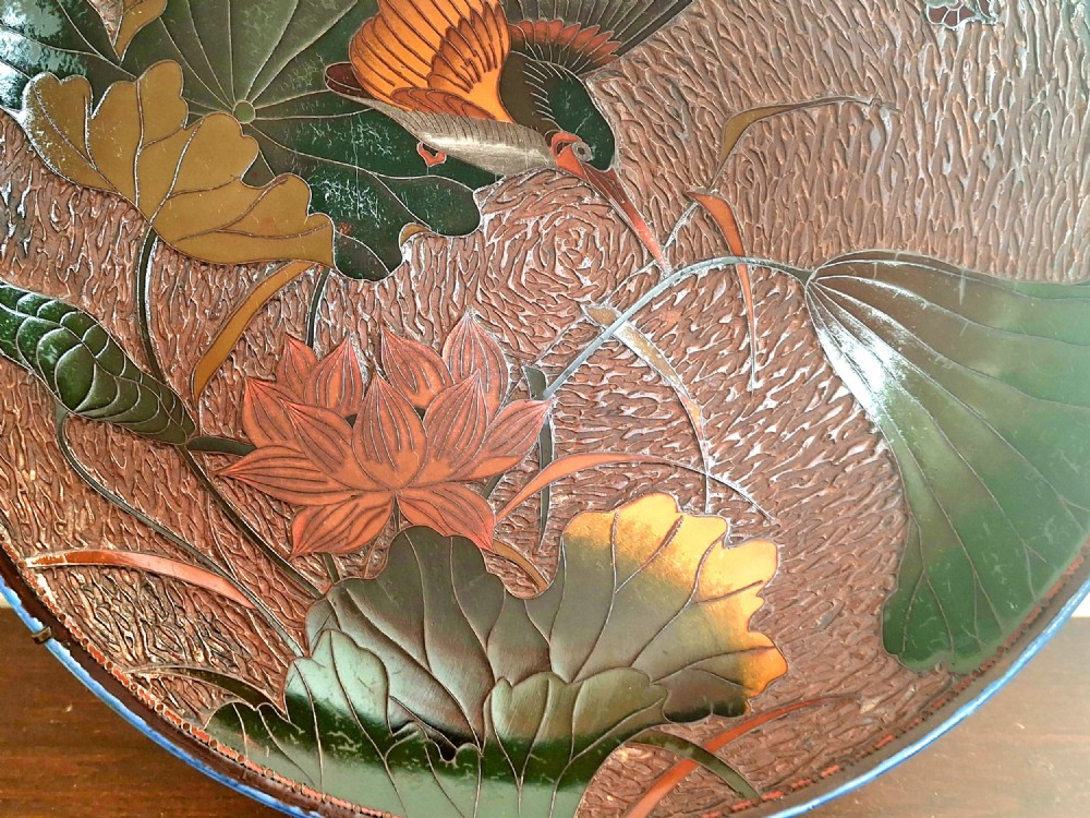 A pair of circular Japanese Totai Shippo porcelain plates depicting birds, lotus flowers, and peonies in polychrome enamel against a textured brown tree bark effect ground. View V