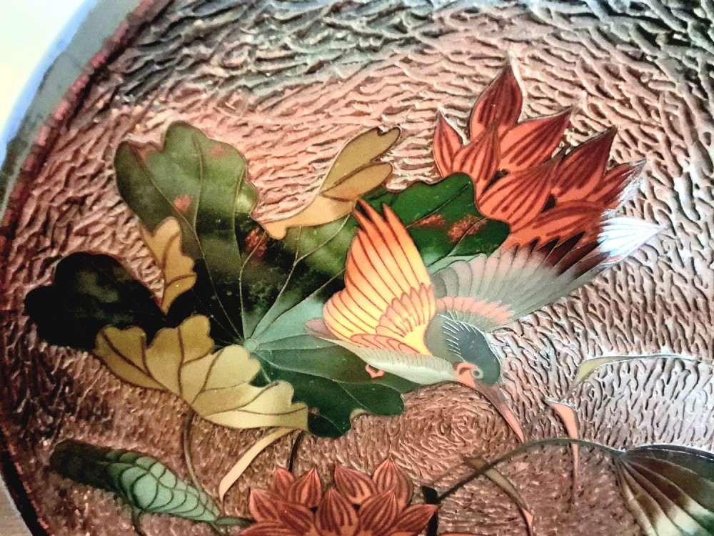 A pair of circular Japanese Totai Shippo porcelain plates depicting birds, lotus flowers, and peonies in polychrome enamel against a textured brown tree bark effect ground. View VII