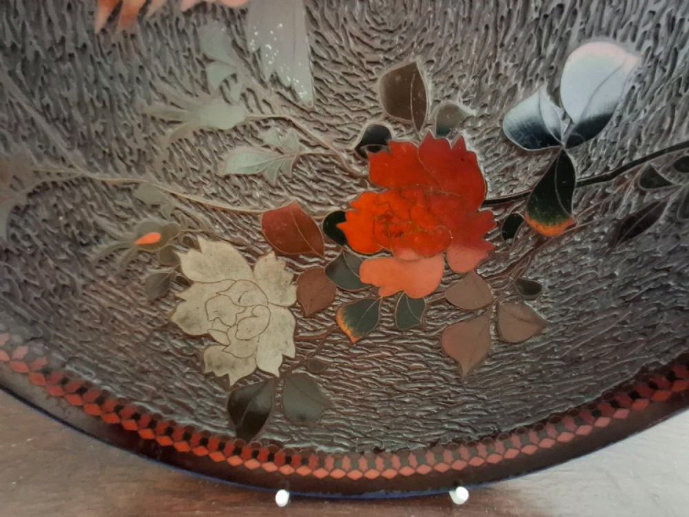 A pair of circular Japanese Totai Shippo porcelain plates depicting birds, lotus flowers, and peonies in polychrome enamel against a textured brown tree bark effect ground. View XIV