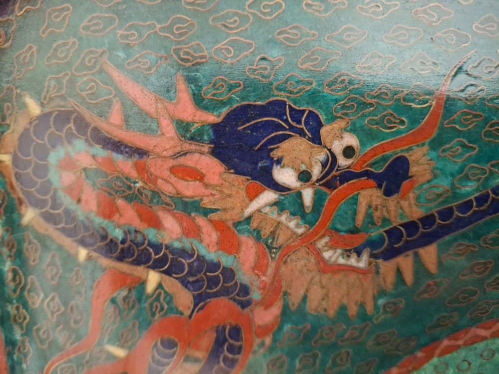 Square Japanese cloisonne enamel tray featuring a central bird motif surrounded by two coiled dragons on a teal patterned ground. View III