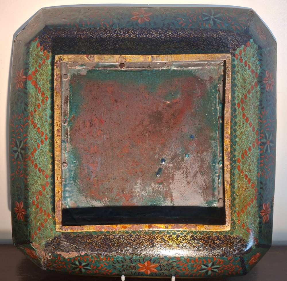 Square Japanese cloisonne enamel tray featuring a central bird motif surrounded by two coiled dragons on a teal patterned ground. View XIII