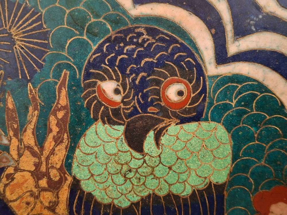 A circular Japanese cloisonne enamel charger featuring an owl, a flying bird, wave patterns, and Mount Fuji against a green ground. View VII