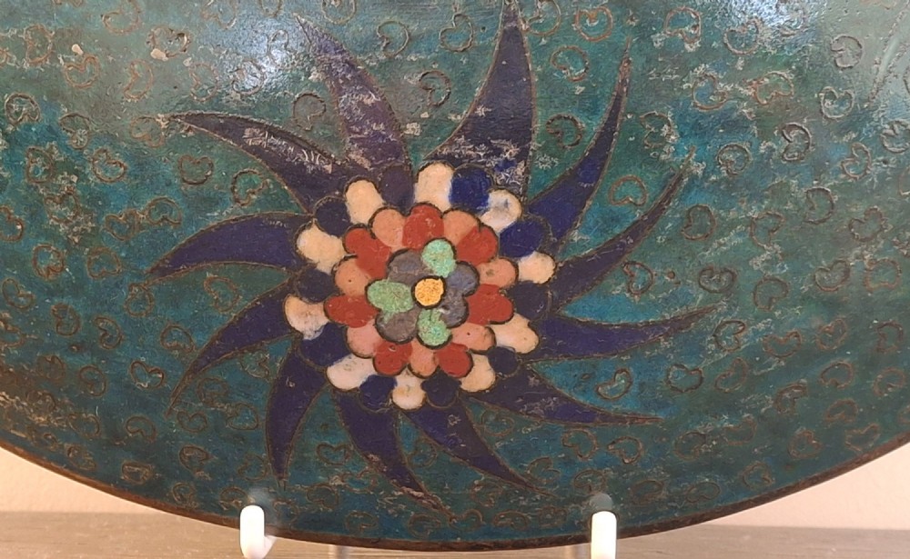 A circular Japanese cloisonne enamel charger featuring an owl, a flying bird, wave patterns, and Mount Fuji against a green ground. View XIII