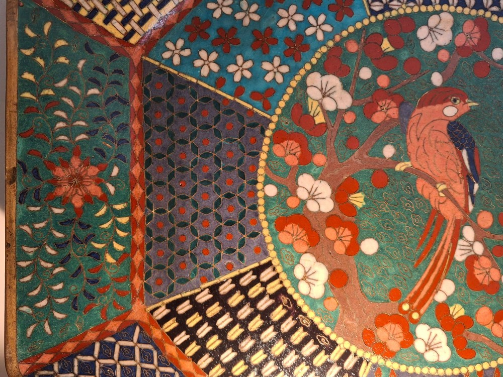 An octagonal antique Japanese cloisonne enamel tray featuring a central bird on a flowering branch surrounded by colourful geometric brocade panels. View V