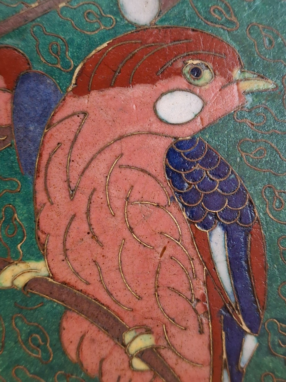 An octagonal antique Japanese cloisonne enamel tray featuring a central bird on a flowering branch surrounded by colourful geometric brocade panels. View XIII