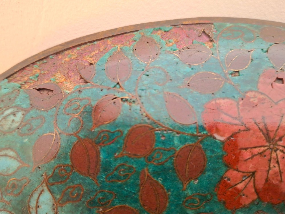 An oval Japanese cloisonne enamel tray displaying a central blue leaping koi carp within stylized waves, surrounded by geometric and red floral patterned borders. View XV