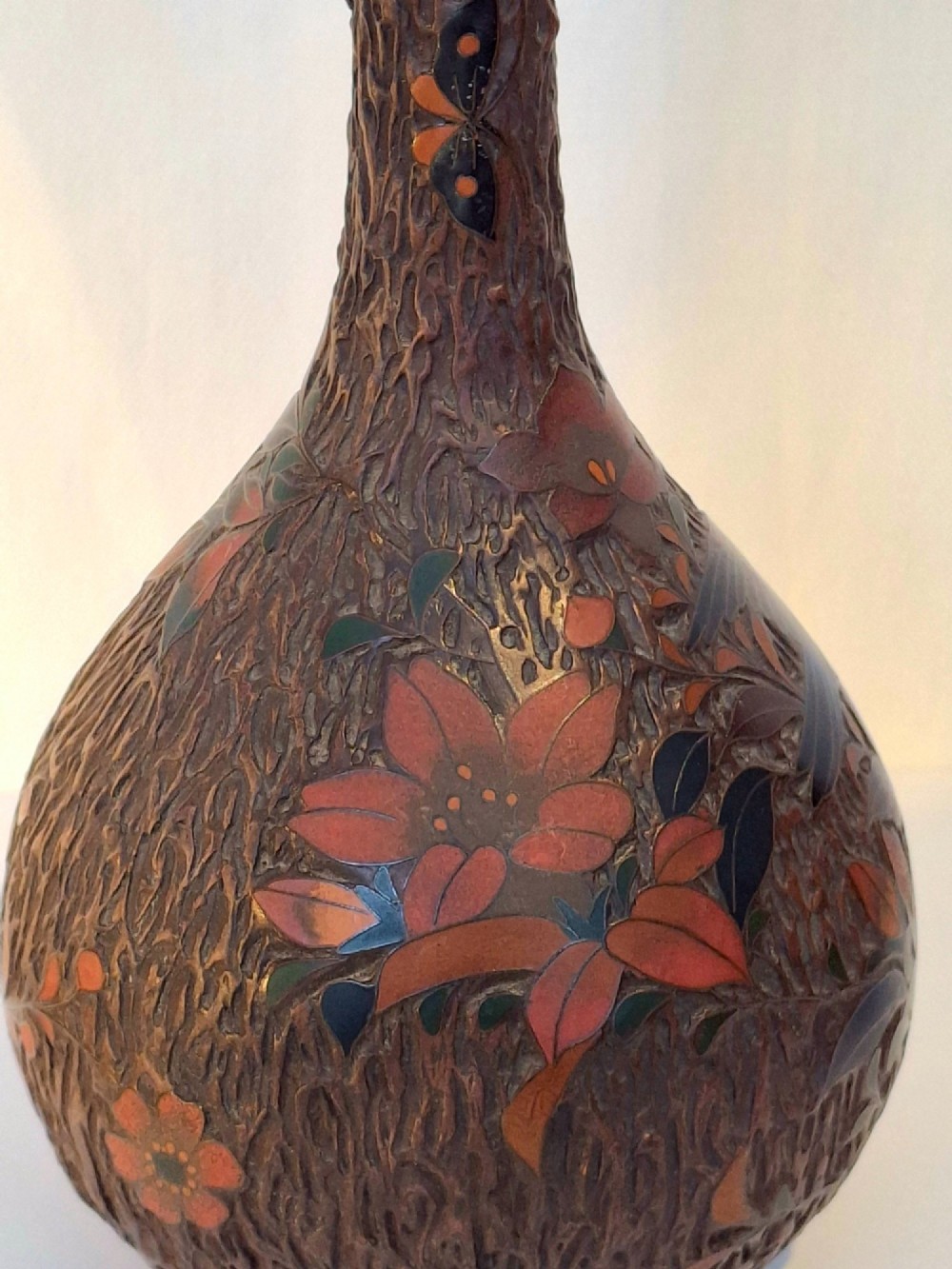 A pair of Japanese Totai Shippo ceramic vases featuring dark brown tree-bark textured surfaces decorated with cloisonne birds and foliage. View III