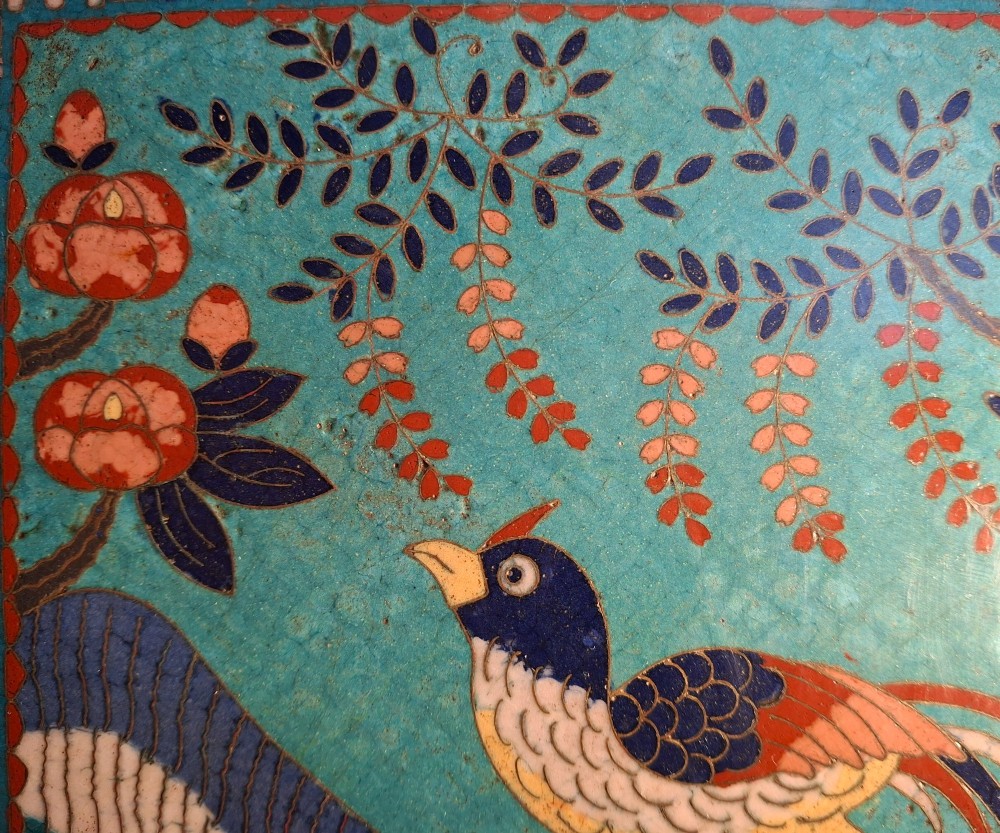 A square Japanese cloisonne enamel tray featuring a central panel with a bird and floral blossoms surrounded by turquoise geometric lattice borders. View XIII