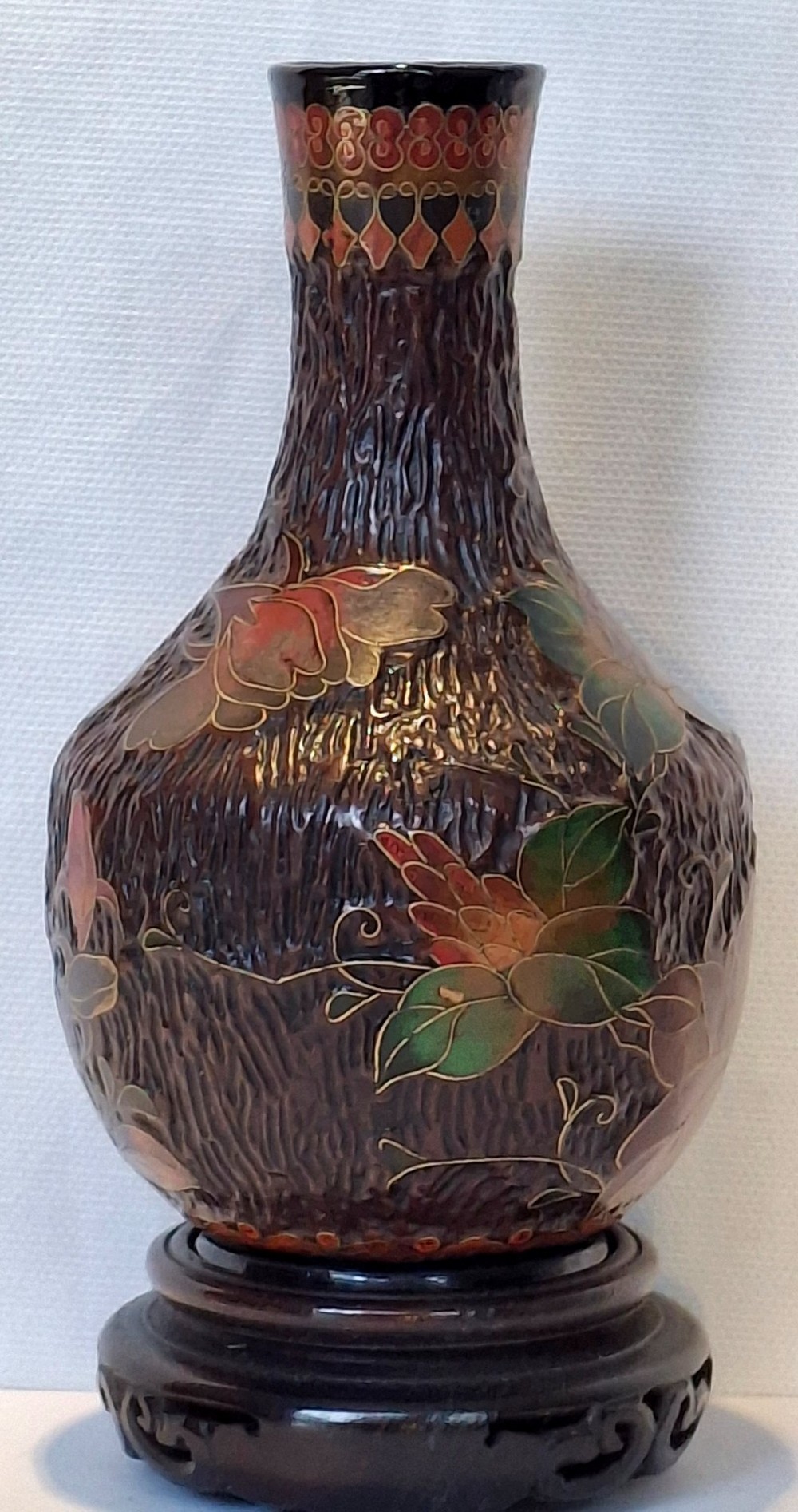 A dark brown Meiji period Japanese Totai Shippo ceramic vase displaying a textured tree bark surface decorated with cloisonne enamel bats and floral patterns. View V