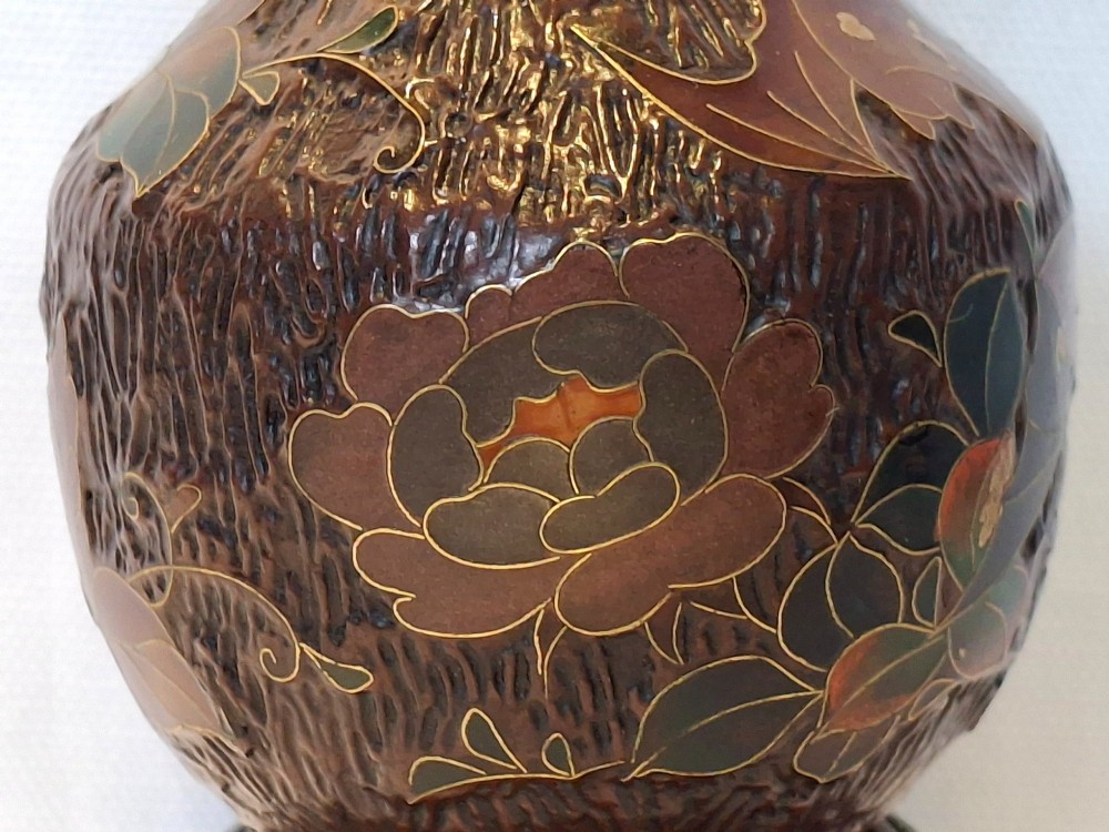 A dark brown Meiji period Japanese Totai Shippo ceramic vase displaying a textured tree bark surface decorated with cloisonne enamel bats and floral patterns. View XI