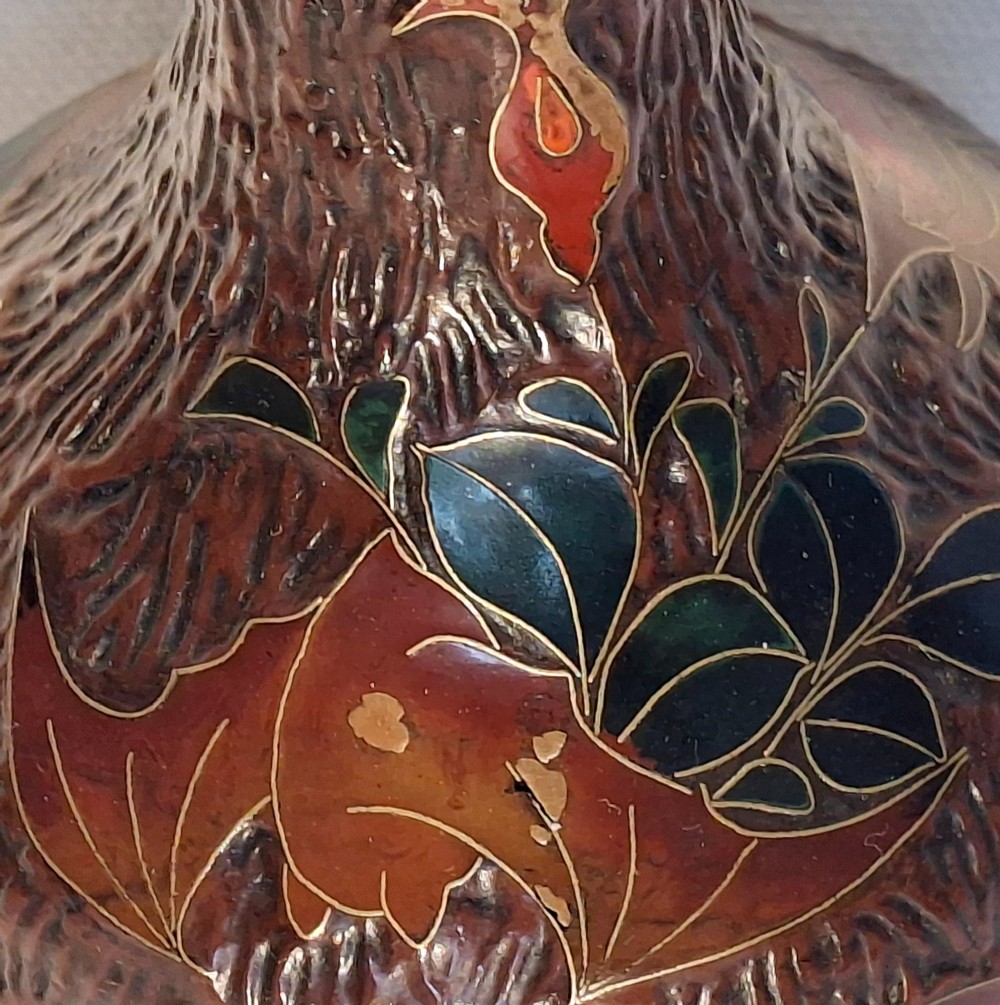 A dark brown Meiji period Japanese Totai Shippo ceramic vase displaying a textured tree bark surface decorated with cloisonne enamel bats and floral patterns. View XIII