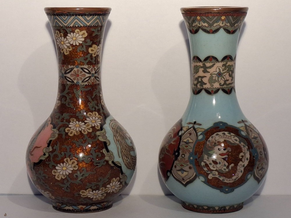 A pair of Japanese Meiji period cloisonne enamel miniature vases featuring detailed dragon and phoenix medallions on brown and light blue grounds. View II
