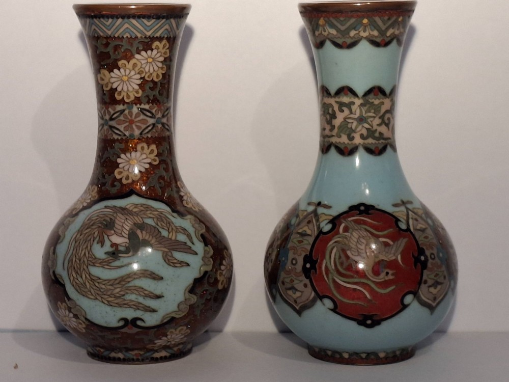 A pair of Japanese Meiji period cloisonne enamel miniature vases featuring detailed dragon and phoenix medallions on brown and light blue grounds. View III
