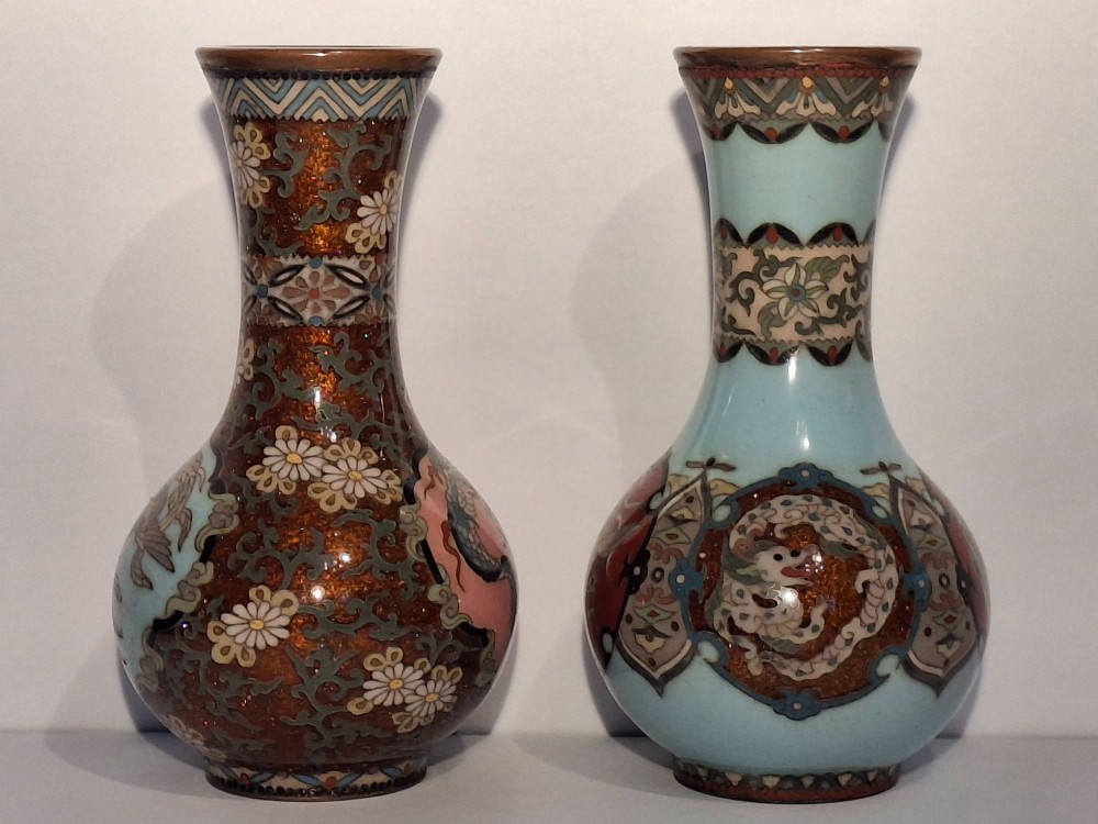A pair of Japanese Meiji period cloisonne enamel miniature vases featuring detailed dragon and phoenix medallions on brown and light blue grounds. View IV