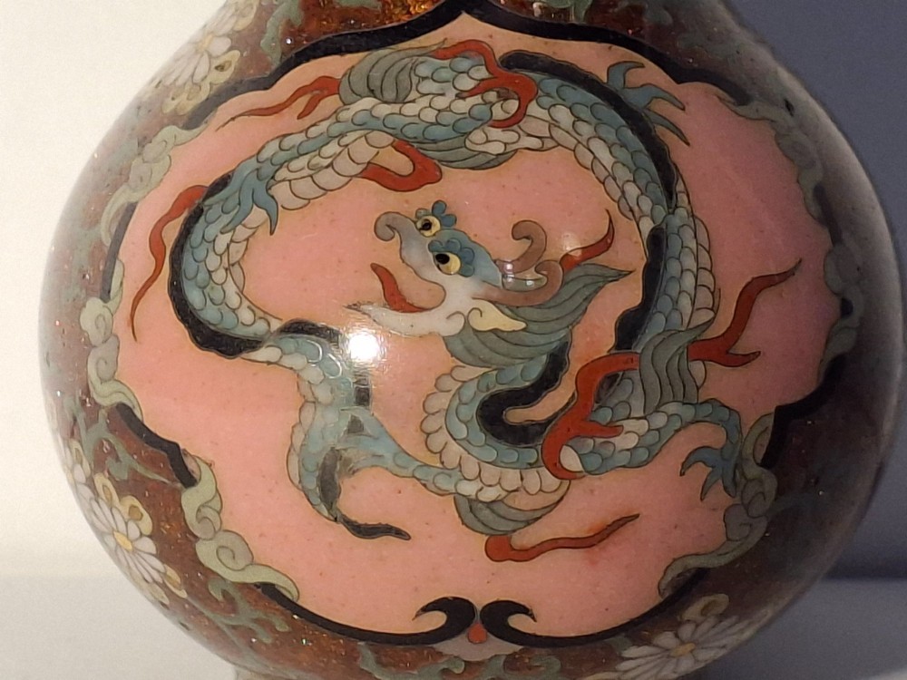 A pair of Japanese Meiji period cloisonne enamel miniature vases featuring detailed dragon and phoenix medallions on brown and light blue grounds. View XII