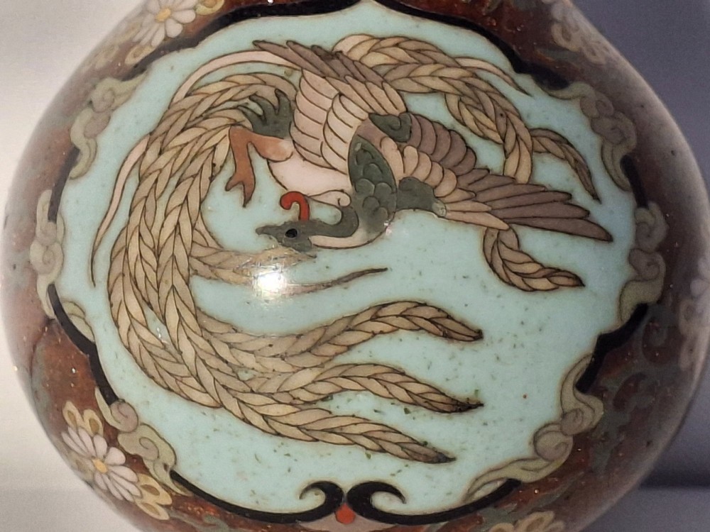 A pair of Japanese Meiji period cloisonne enamel miniature vases featuring detailed dragon and phoenix medallions on brown and light blue grounds. View XIII
