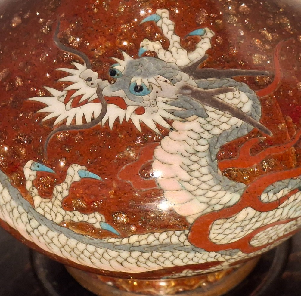 A miniature dark red Japanese cloisonne enamel vase featuring a detailed coiled dragon motif and a slender neck. View VI