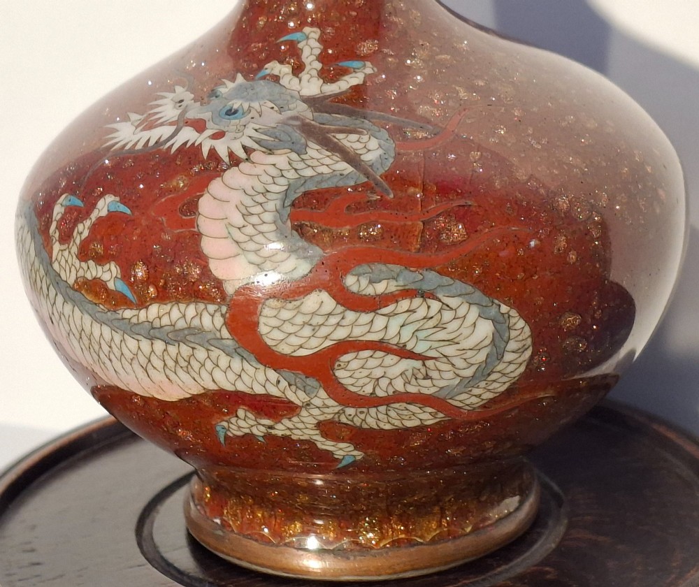 A miniature dark red Japanese cloisonne enamel vase featuring a detailed coiled dragon motif and a slender neck. View VII