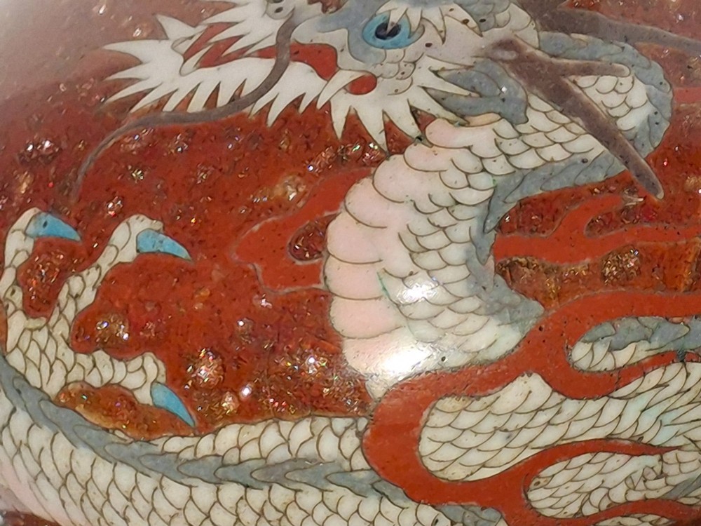 A miniature dark red Japanese cloisonne enamel vase featuring a detailed coiled dragon motif and a slender neck. View VIII