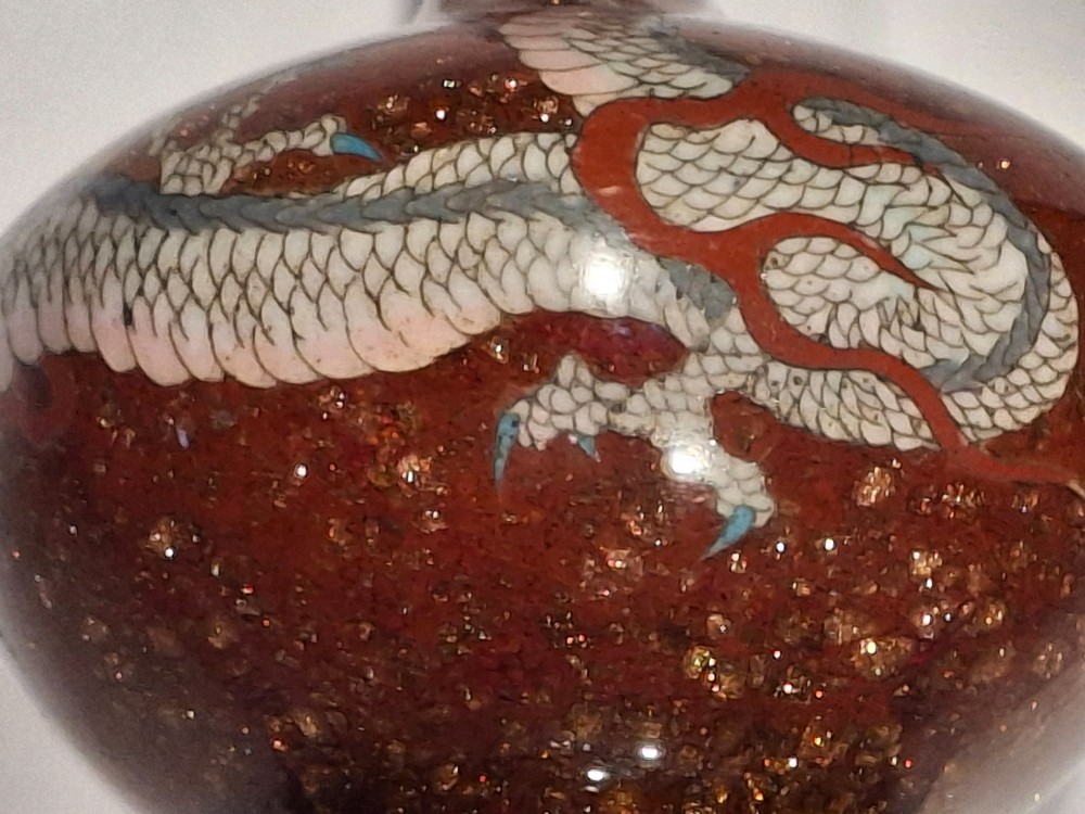 A miniature dark red Japanese cloisonne enamel vase featuring a detailed coiled dragon motif and a slender neck. View XIII