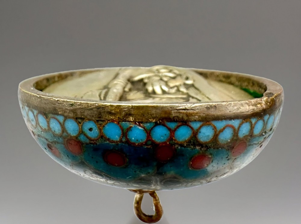 A domed Japanese cloisonne enamel ash receiver cover decorated with black scrollwork, turquoise patterned borders, red dots, and a brass top loop. View VI