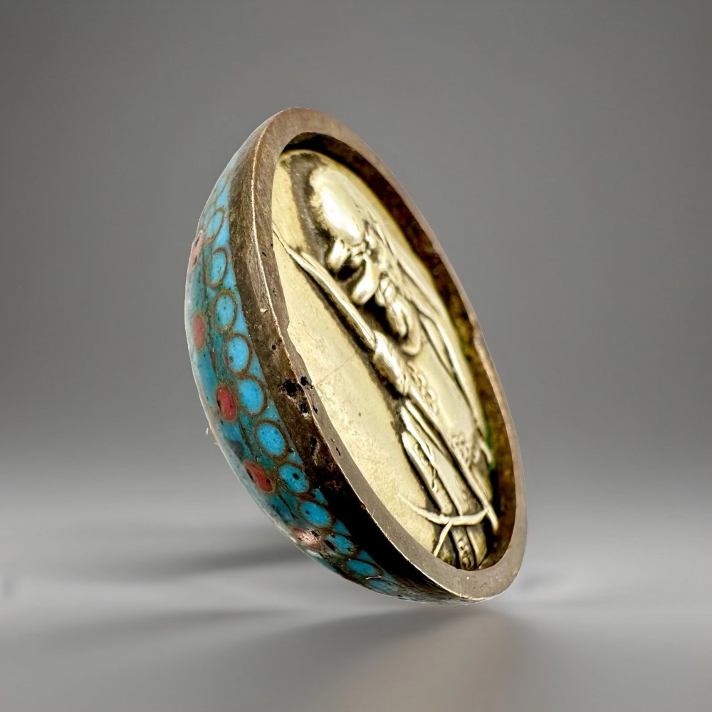 A domed Japanese cloisonne enamel ash receiver cover decorated with black scrollwork, turquoise patterned borders, red dots, and a brass top loop. View IX