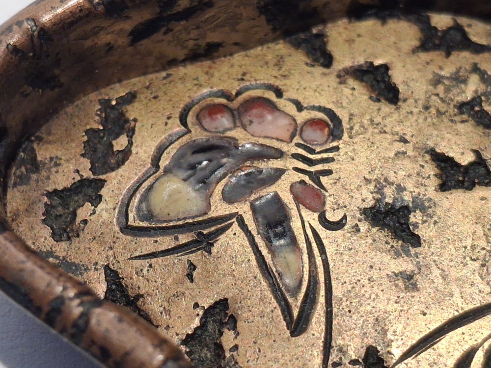 An oval-shaped antique Japanese bronze recessed door pull featuring two decorative enamel butterflies against a textured gilded background. View XV