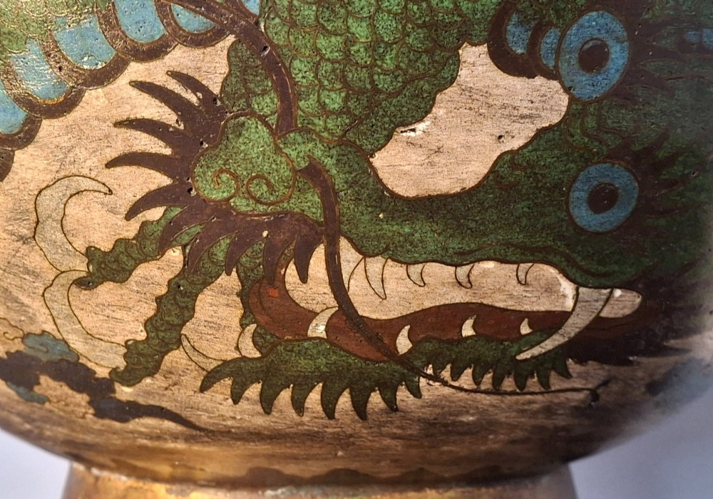 A large Japanese cloisonne enamel bowl featuring green dragon motifs, displayed on a carved dark wooden stand. View X