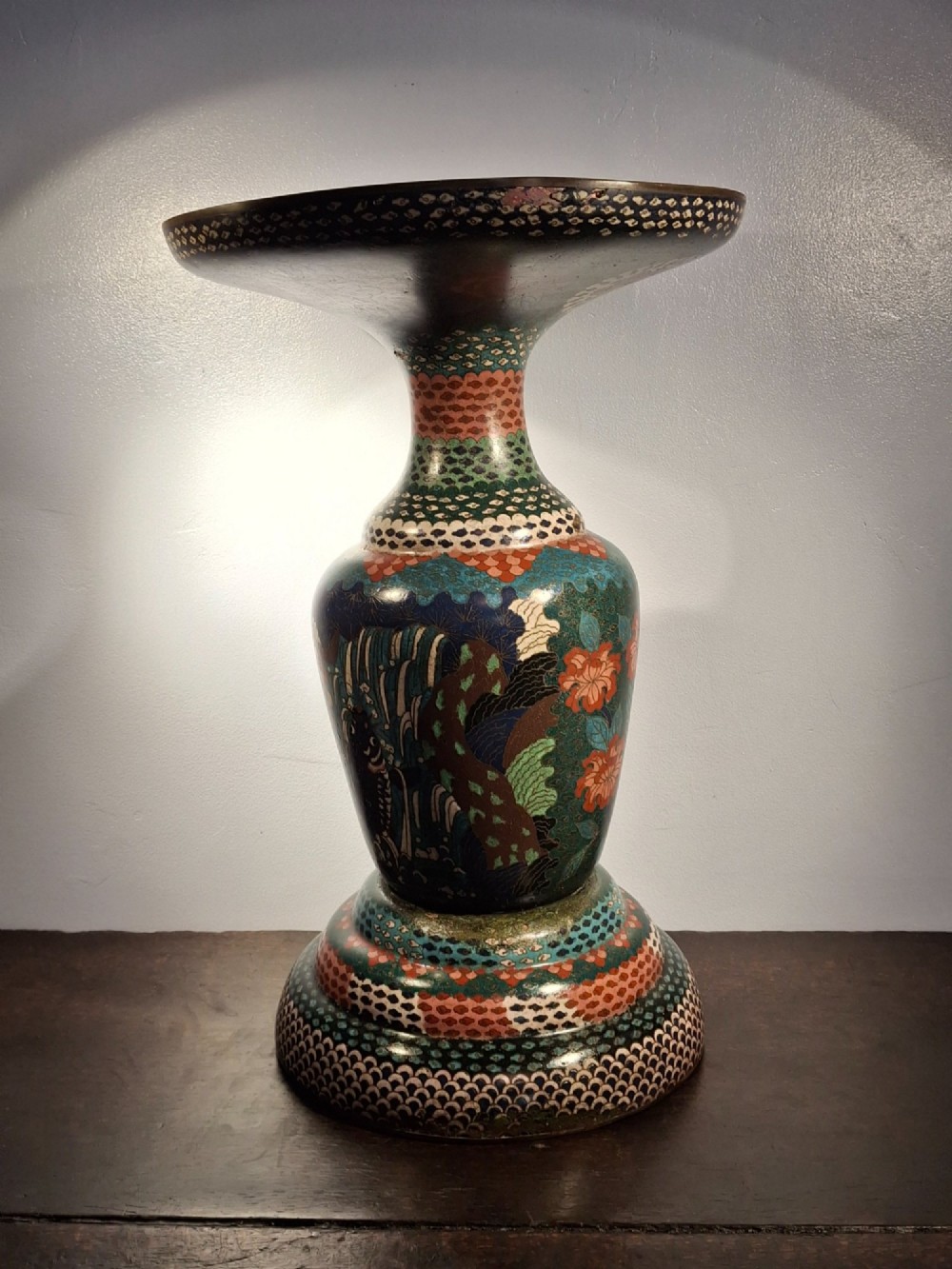 A large Japanese Meiji period cloisonne enamel vase with a wide flared top, decorated with a leaping koi carp motif amongst waterfalls and polychrome geometric patterns. View III