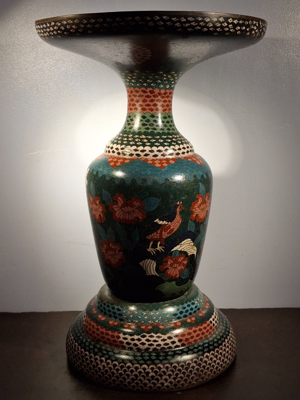 A large Japanese Meiji period cloisonne enamel vase with a wide flared top, decorated with a leaping koi carp motif amongst waterfalls and polychrome geometric patterns. View IV