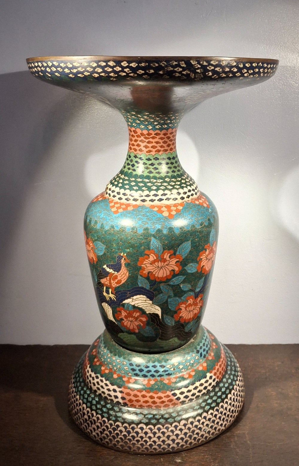 A large Japanese Meiji period cloisonne enamel vase with a wide flared top, decorated with a leaping koi carp motif amongst waterfalls and polychrome geometric patterns. View V
