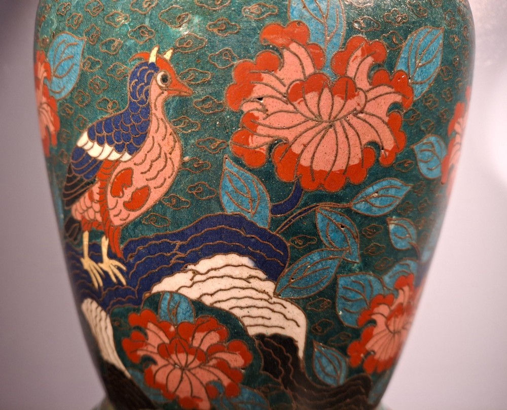 A large Japanese Meiji period cloisonne enamel vase with a wide flared top, decorated with a leaping koi carp motif amongst waterfalls and polychrome geometric patterns. View VI