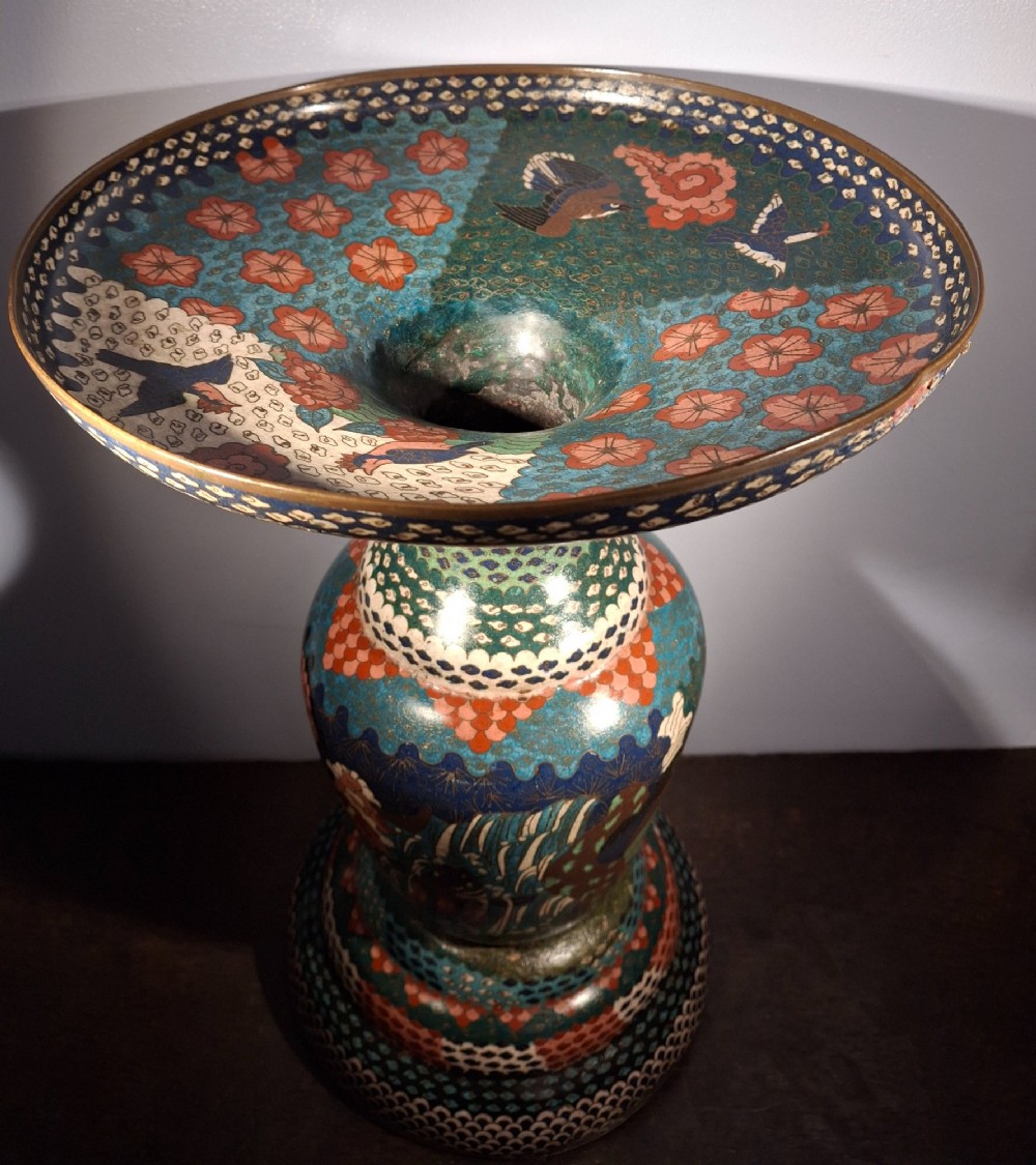 A large Japanese Meiji period cloisonne enamel vase with a wide flared top, decorated with a leaping koi carp motif amongst waterfalls and polychrome geometric patterns. View X