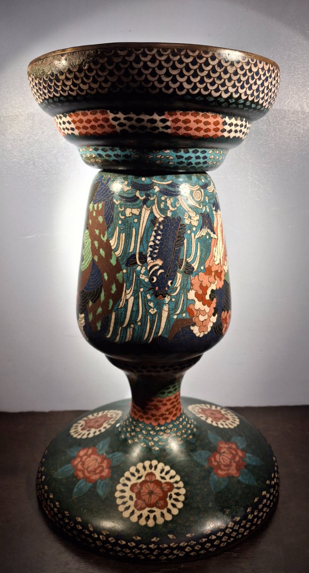 A large Japanese Meiji period cloisonne enamel vase with a wide flared top, decorated with a leaping koi carp motif amongst waterfalls and polychrome geometric patterns. View XII