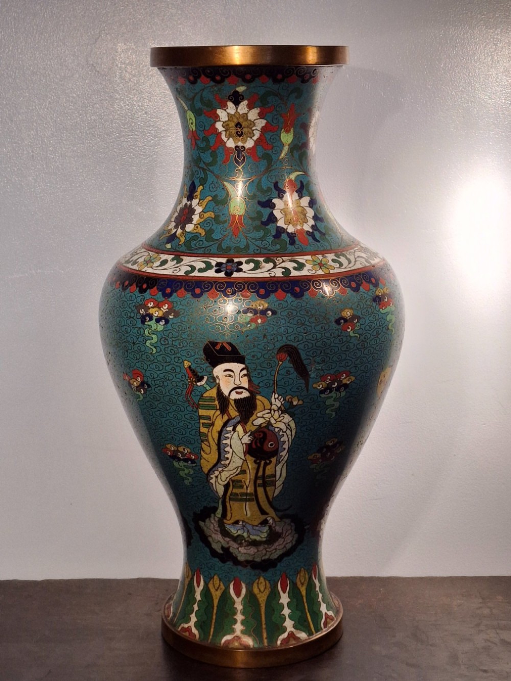 A large Chinese cloisonne enamel baluster vase decorated with scholar figures on a turquoise scrollwork ground with gilded rims. View III