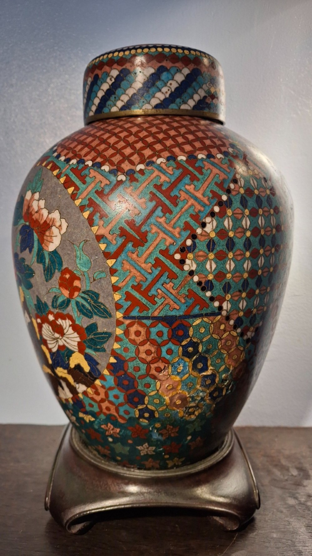 A nineteenth-century Japanese cloisonne enamel ginger jar featuring a patterned mosaic design and a colourful bird among floral motifs. View IV