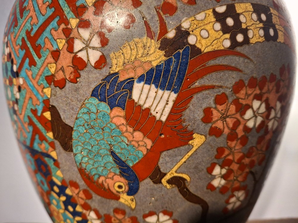 A nineteenth-century Japanese cloisonne enamel ginger jar featuring a patterned mosaic design and a colourful bird among floral motifs. View VII