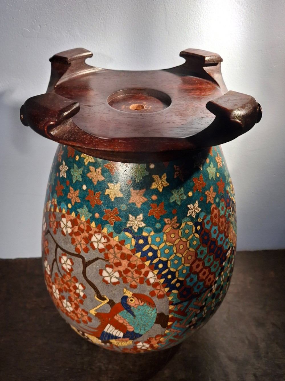 A nineteenth-century Japanese cloisonne enamel ginger jar featuring a patterned mosaic design and a colourful bird among floral motifs. View XV